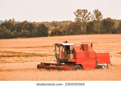 Efficient Agricultural Operations. Machinery Cultivating Fields and Harvesting at Sunset. Rural landscape. - Shutterstock ID 2354101965