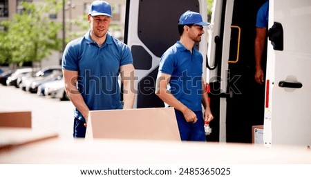 Efficient Delivery Team Transporting Warehouse Supplies: Business Chain Logistics in Action with Smiling Movers Unloading Cardboard Boxes from Truck