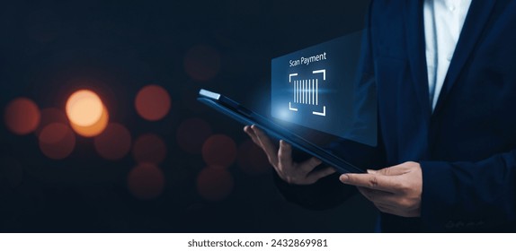 Efficient Tablet Payment: Business Person Utilizing QR Code Scan on Smartphone for Seamless Online Banking, Enabling Person-to-Person and Person-to-Business Cash Transfers.