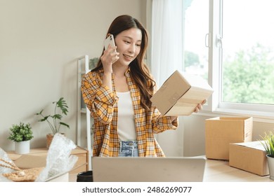 Efficiently preparing packages for seamless shipping. The hands of an online store meticulously pack and protect products, ensuring a smooth fulfillment process for satisfied customers worldwide.