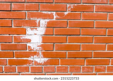 Efflorescence on new red bricks wall - Shutterstock ID 2315223733