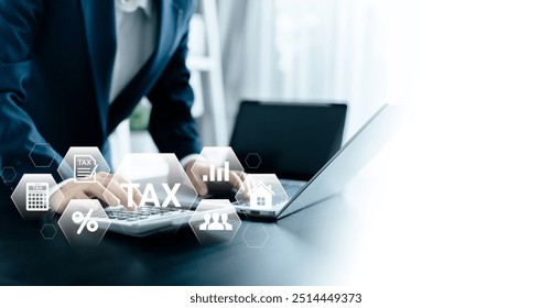 E-Filing, Taxpayer using a laptop to file taxes personal income, Tax Return form online for tax payment. Government, state taxes. Data analysis, paperwork, reports. Calculation tax return.