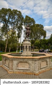 EGER, HUNGARY - SEPTEMBER 27, 2013: Fountain with a statue of a young lady in the Valley of Beautiful Women in the town of Eger famous for its wine production and thermal springs.