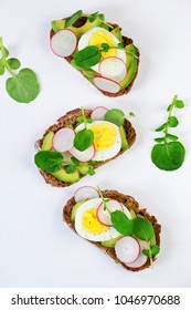 Egg And Avocado Sandwich Isolated. Avocado And Egg Toast On The White Background. Top View Toast