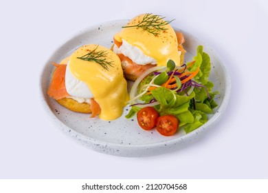 Egg Benedict - toasted English muffins, ham, poached eggs, smoked salmon avocado and delicious buttery hollandaise sauce