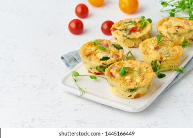 Egg Bites, Omelet Muffin With Tomatoes And Bacon, Baked Eggs With Spinach And Broccoli, Closeup With Copy Space, Keto, Ketogenic Diet