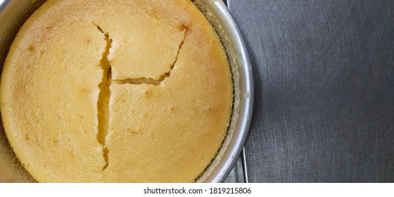 Egg Cake In A Container On A Stainless Steel Worktop After Leaving The Oven.