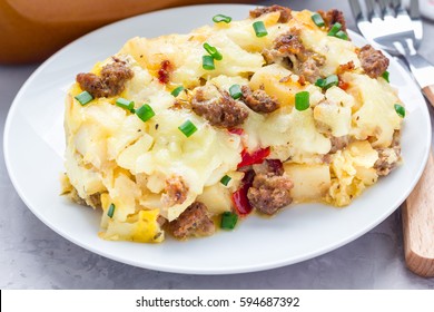 Egg Casserole With Potatoes, Sausage And Pepper, On White Plate, Horizontal