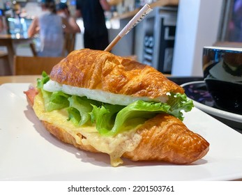 Egg And Cheese Croissant, Black Coffee