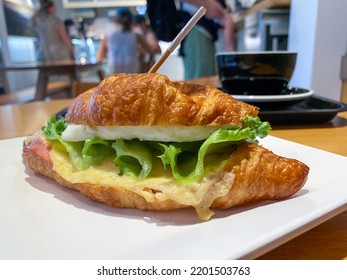 Egg And Cheese Croissant, Black Coffee