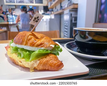 Egg And Cheese Croissant, Black Coffee