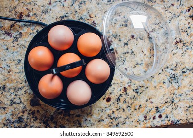 Egg Cooker With Eggs On Stand