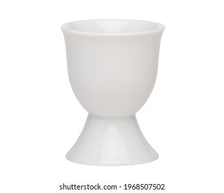 Egg cup. Empty ceramic eggcup for breakfast. Holder stand for boiled chicken eggs on white isolated background.