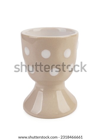 Egg cup on white background