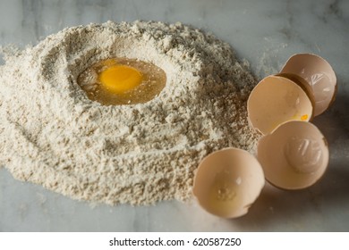 Egg in flour with shells 