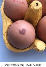 Egg with a heart on the shell