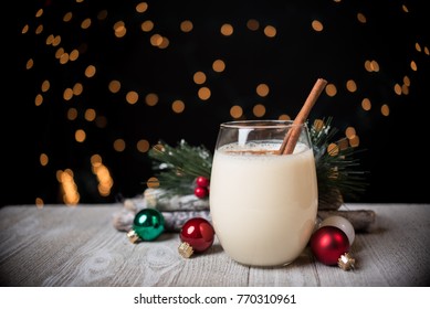 Egg Nog With Christmas Ornaments And Lights