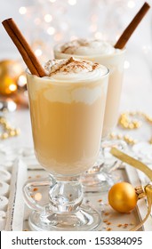 Egg Nog With Cinnamon Sticks