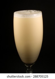 Egg Nog Cocktail Isolated On Black Background