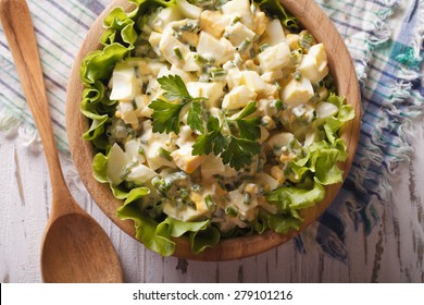 Egg Salad With Herbs In A Wooden Bowl, Close-up, Rustic Style. Horizontal View From Above 