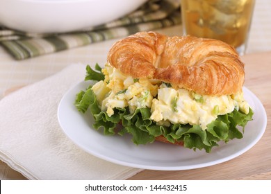 Egg Salad With Lettuce Sandwich On A Croissant Roll