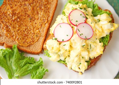 Egg Salad Sandwich On Whole Wheat Bread With Deli Mustard, Lettuce, Radishes And Chives