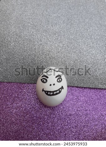 Egg smily face and naughty shape art on egg.white egg with shiny background. 