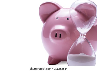 Egg Timer, At The End Of The Countdown, Next To A Porcelain Pink Piggy Bank, Concept Of Savings And Term Deposit, Close-up With Shadow On White