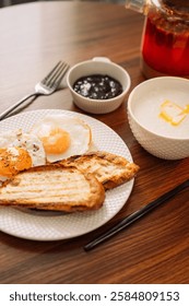 Egg and toast for breakfast.