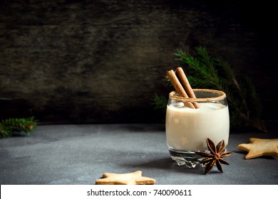 Eggnog With Cinnamon And Nutmeg For Christmas And Winter Holidays. Homemade Eggnog In Glass With Spicy Rim.