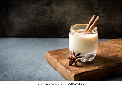 Eggnog With Cinnamon And Nutmeg For Christmas And Winter Holidays. Homemade Eggnog In Glasses With Spicy Rim.