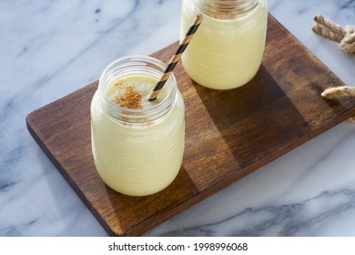 Eggnog on wood and marble table