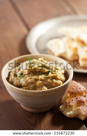 Eggplant baba ganoush with flat bread and herbs