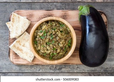 Eggplant Baba Ganoush On Wooden Background

