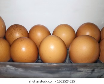 Eggs Are Arranged In A Chilled Egg Tray In The Refrigerator.