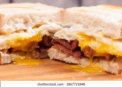 Eggs, Bacon And Cheve Cheese Breakfast Sandwich With Pan Fried Potatoes