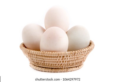 Eggs in the basket Isolated on White Background