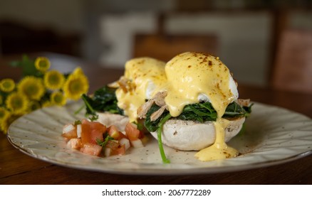 Eggs Benedict With Chicken And Holland Sauce. Gluten Free Bread. Healthy Food Concept