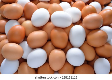 Eggs, brown and white in pile