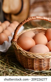 Eggs in wicker basket on table close-up - Shutterstock ID 209226277
