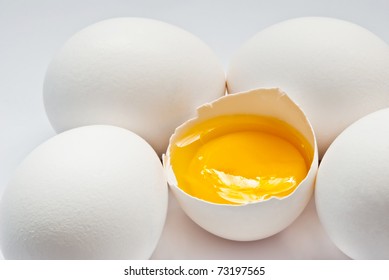 Eggs With Yolk On A Grey Background