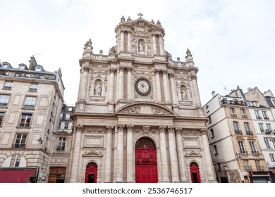 Eglise Saint Paul Saint Louis in Paris is a stunning example of Baroque architecture. Cathedral Facade intricate stonework, paired with elegant sculptures - Powered by Shutterstock