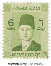 EGYPT - 1940: An 6 Milliemes Light Yellow-green Postage Stamp Showing Portrait Of King Farouk I. Tenth Ruler Of Egypt From The Muhammad Ali Dynasty And The Penultimate King Of Egypt And The Sudan