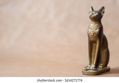 egypt cat statuette on solid background