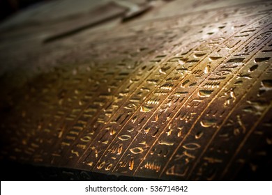 Egypt language symbols written or carved on mummy coffin or Sarcophagus kept at museum