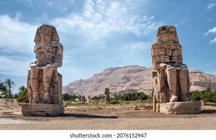 Egypt. Luxor. The Colossi of Memnon - two massive stone statues of Pharaoh Amenhotep III