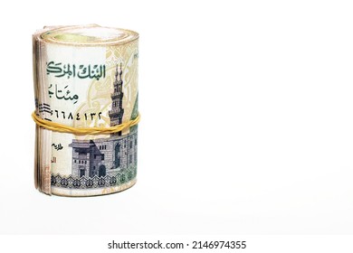 Egypt money roll pounds isolated on white background, 200 LE two hundred Egyptian pounds cash money bills rolled up with rubber bands with a image of Qani Bay mosque on the banknote, selective focus - Shutterstock ID 2146974355