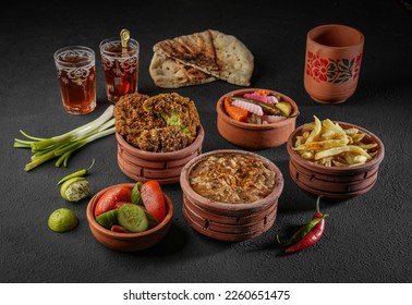 Egyptian Breakfast - Traditional egyptian food, middle eastern food foul medames It's also Ramadan food, and Falafel or Egyptian falafel. - Shutterstock ID 2260651475