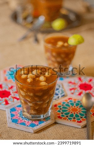 Egyptian drink that consists of tomato broth and chickpeas 
Chickpeas soup, Chickpeas drink, Hummus elsham, Halabesa
