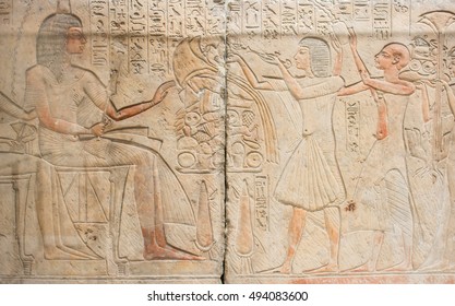 Egyptian Hieroglyphs On The Stone Wall